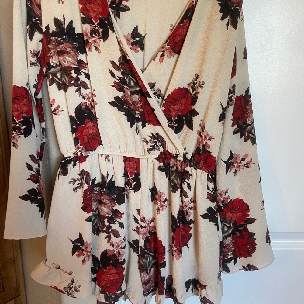 Long sleeved rose romper. Size M